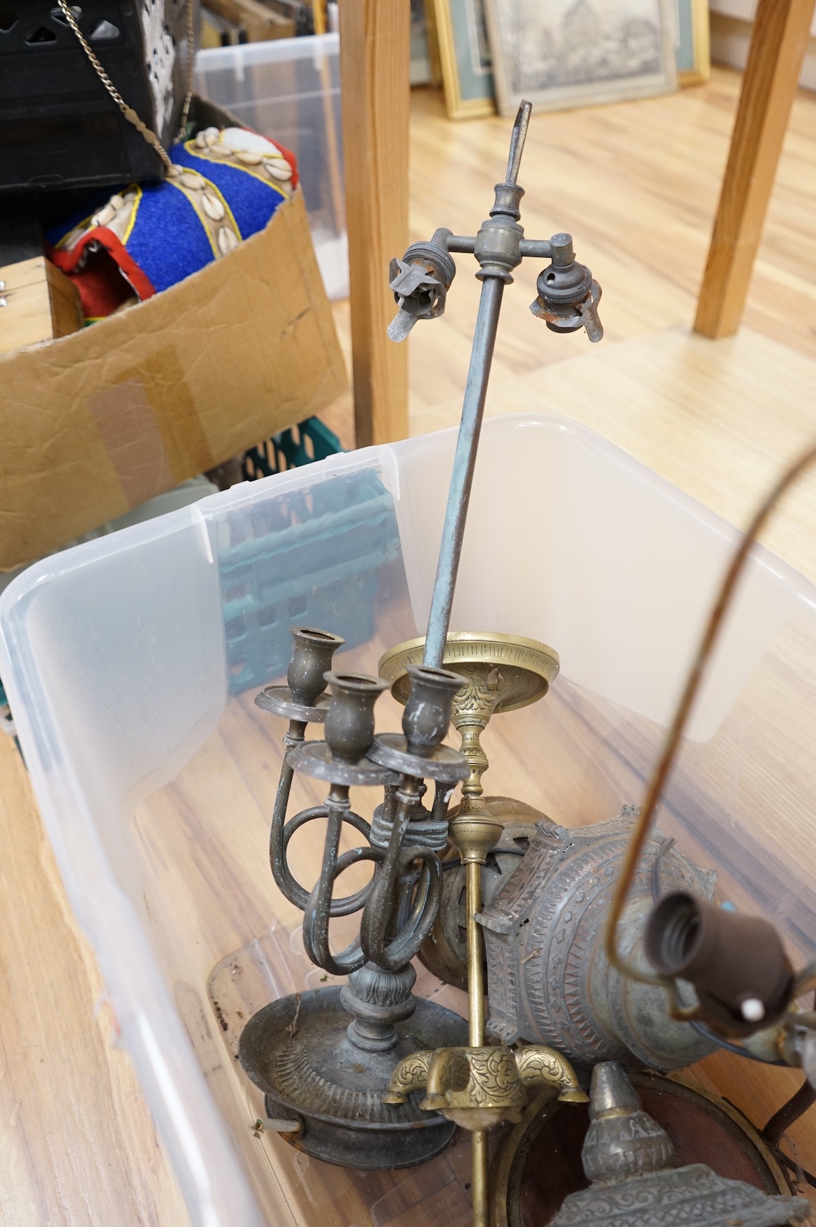 A collection mixed metal ware to include table lamps planters and a pestle and mortar
